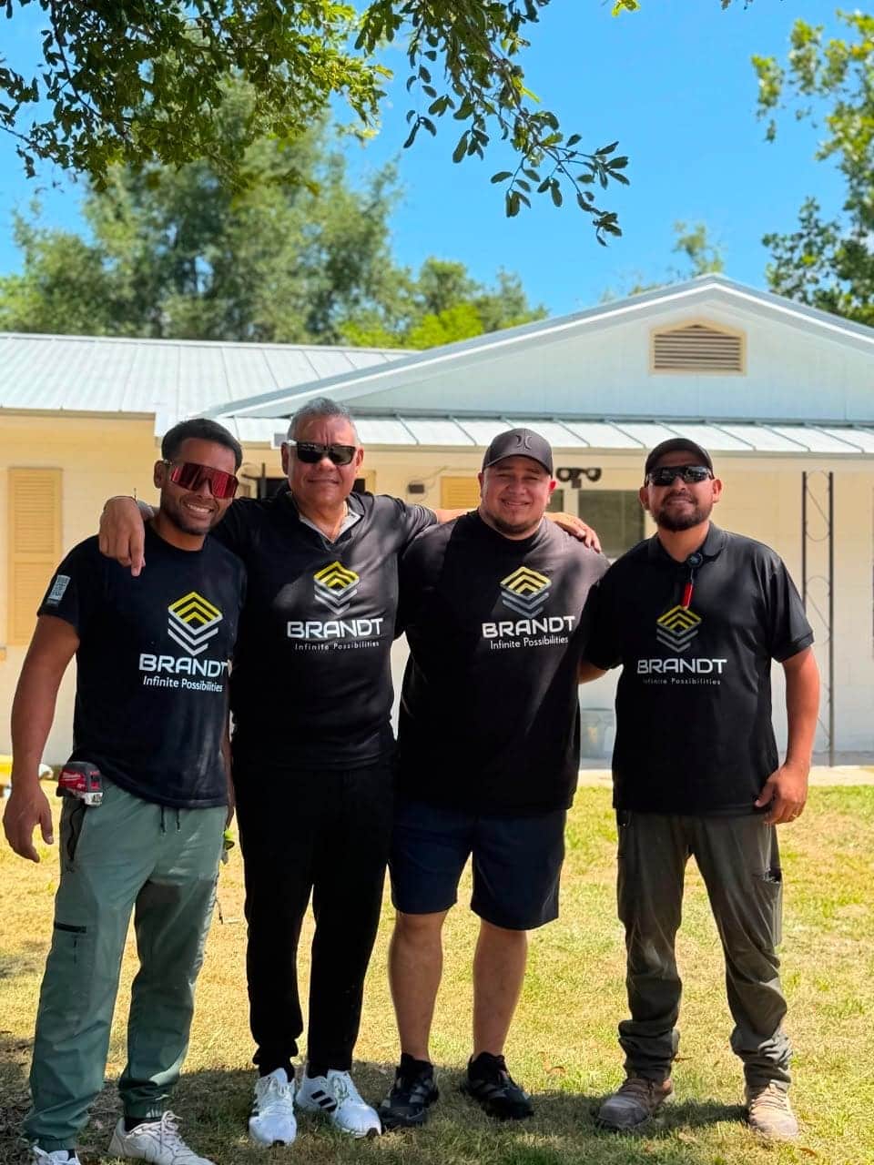 Brandt team outside a serviced property