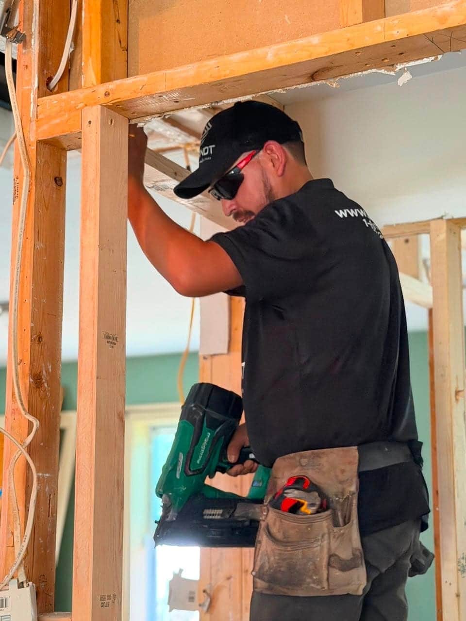 Brandt team member completing framing work